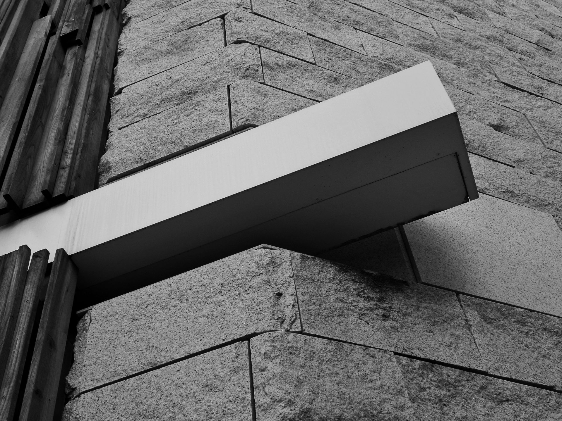 gray concrete bench on gray concrete floor